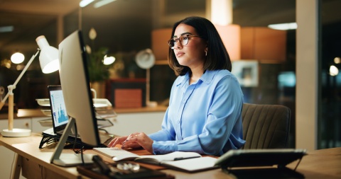 Global HR manager researching payroll tax in Kazakhstan