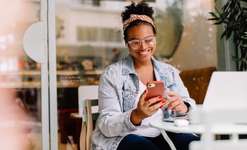 Global HR manager researching employee mentorship programs to implement