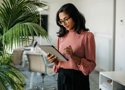 Woman looking at tablet
