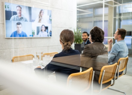 HR team discusses getting work visas in Malaysia in a video conference
