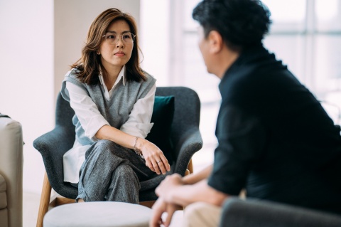 Global HR team members discussing Vietnam work visa