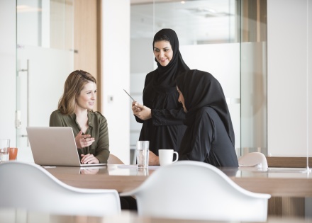 Colleagues discuss global trends in human resource management