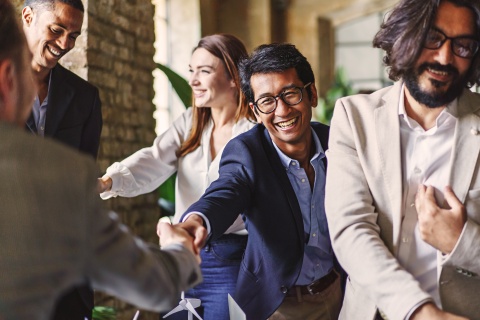 Business professionals celebrating workplace culture in the Philippines