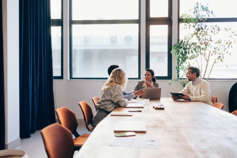 HR team discusses time zone management for distributed teams