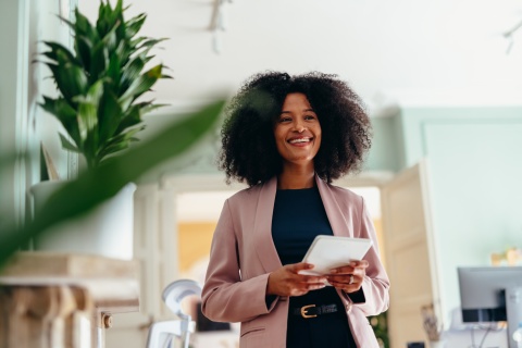 HR manager creating an employee handbook for remote teams