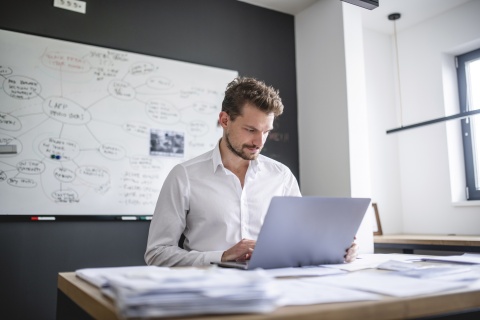 HR manager researching the best payroll service for small businesses