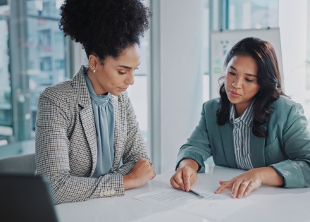 Coworkers discuss expanding into the East African Community (EAC)